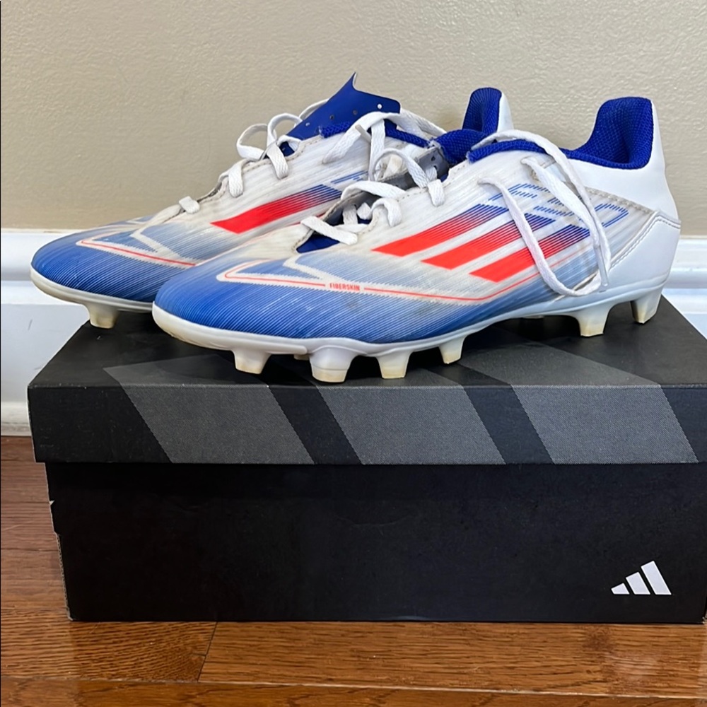 Adidas White and Blue Athletic Shoes with Modern Design